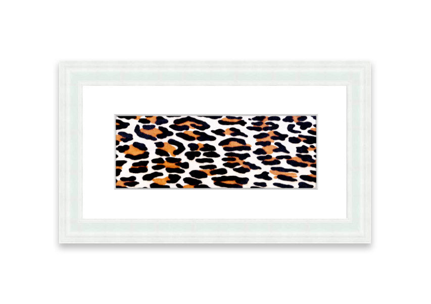 A beautifully framed print of animal skin design, showcasing intricate textures and colors, ready to hang on the wall.