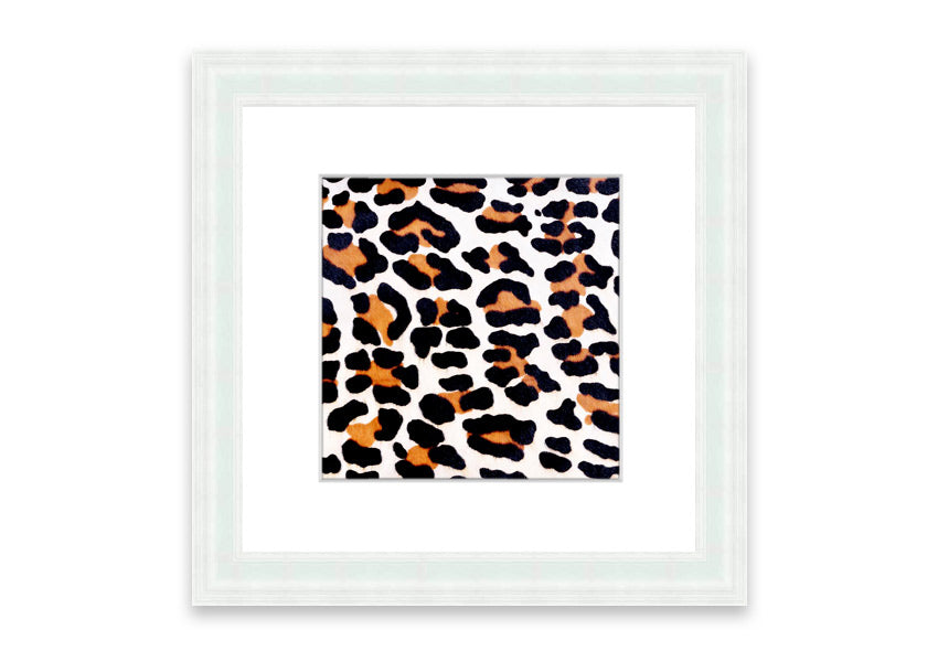 A beautifully framed print of animal skin design, showcasing intricate textures and colors, ready to hang on the wall.