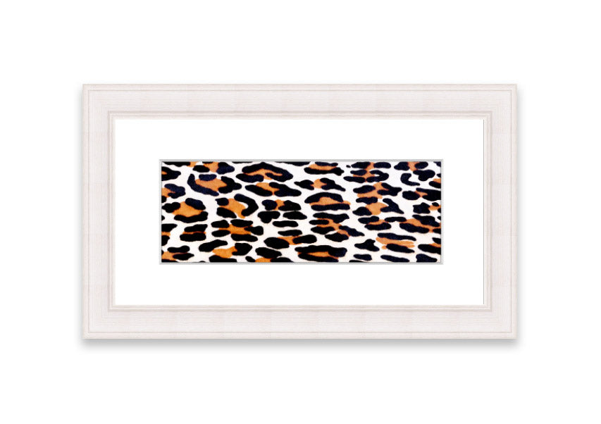 A beautifully framed print of animal skin design, showcasing intricate textures and colors, ready to hang on the wall.