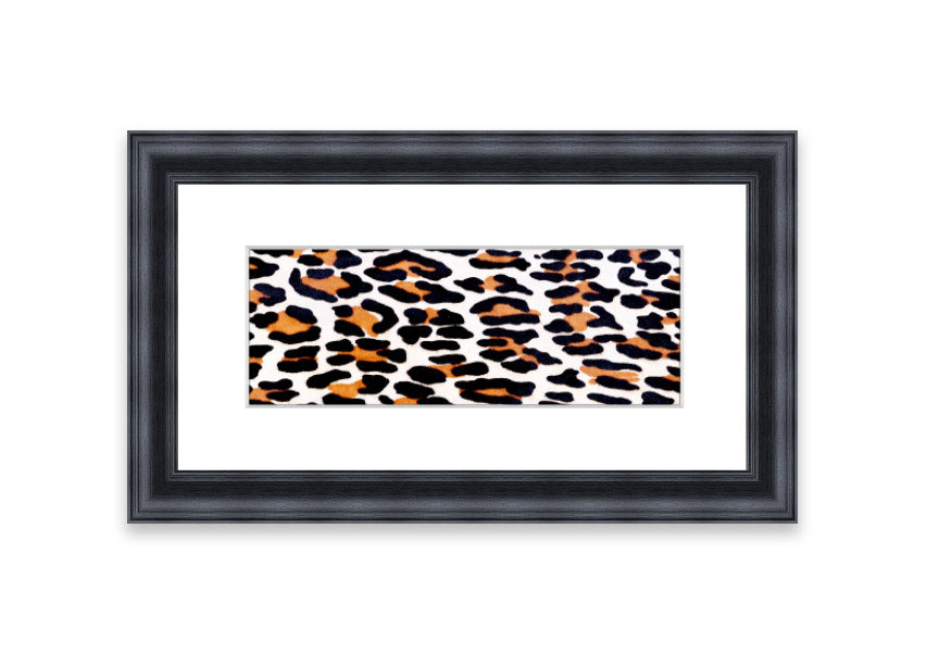 A beautifully framed print of animal skin design, showcasing intricate textures and colors, ready to hang on the wall.