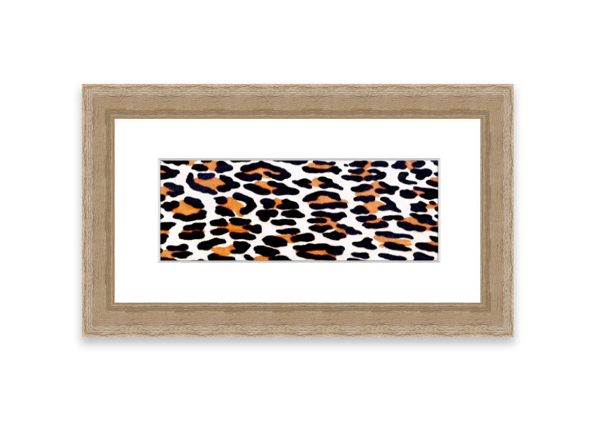 A beautifully framed print of animal skin design, showcasing intricate textures and colors, ready to hang on the wall.