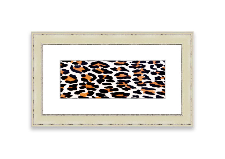 A beautifully framed print of animal skin design, showcasing intricate textures and colors, ready to hang on the wall.