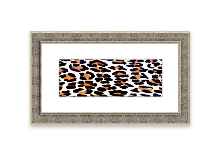 A beautifully framed print of animal skin design, showcasing intricate textures and colors, ready to hang on the wall.