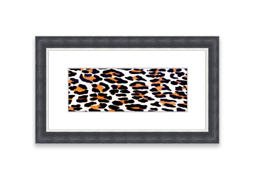 A beautifully framed print of animal skin design, showcasing intricate textures and colors, ready to hang on the wall.