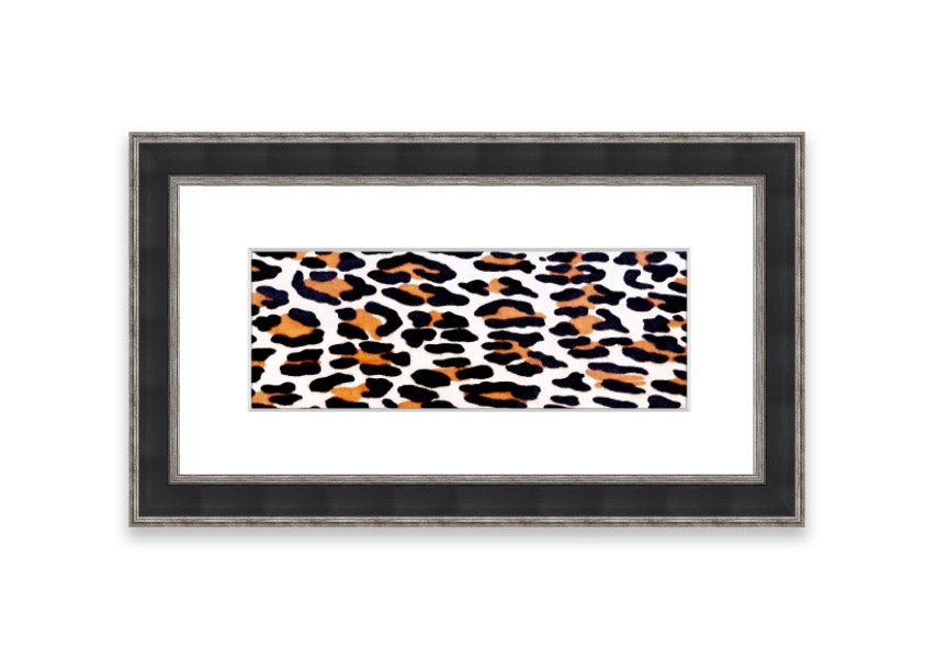 A beautifully framed print of animal skin design, showcasing intricate textures and colors, ready to hang on the wall.