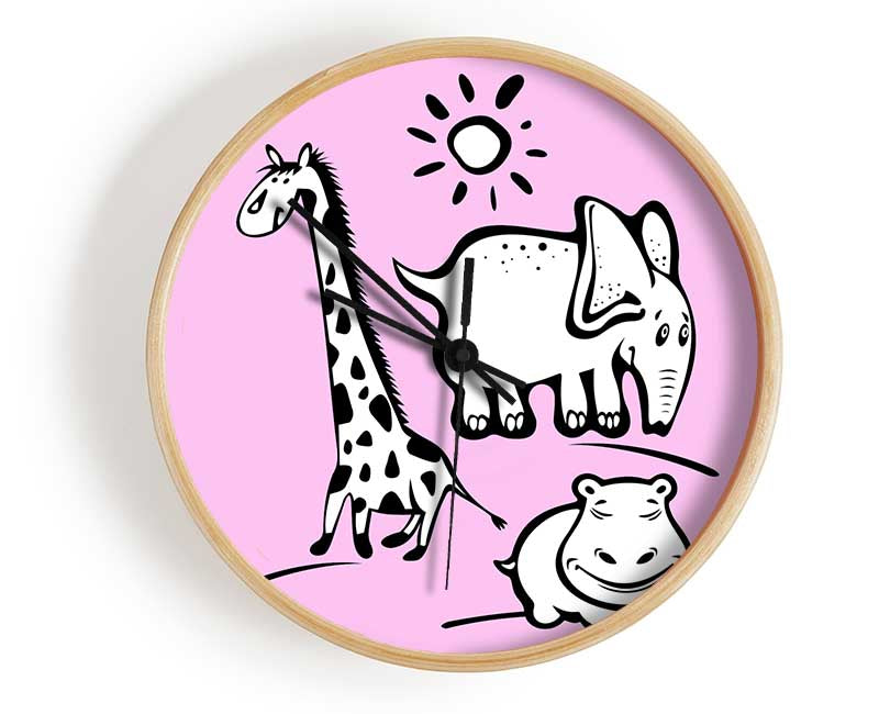 Animals Under The Sun Pink clock made from natural bamboo with a round face and clear Plexiglas lens, available in multiple colors.