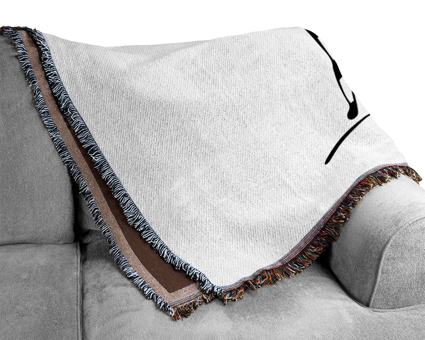 A luxurious white throw blanket made from 100% cotton, featuring a thermal weave design, perfect for enhancing home decor.