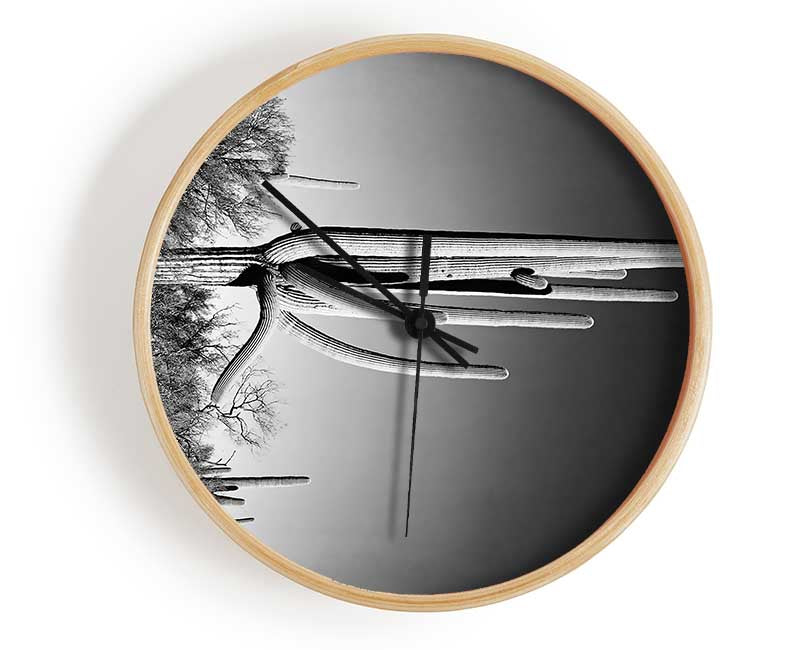 Ansel Adams Cactus clock featuring a round bamboo design with a clear Plexiglas lens, showcasing a beautiful cactus landscape.