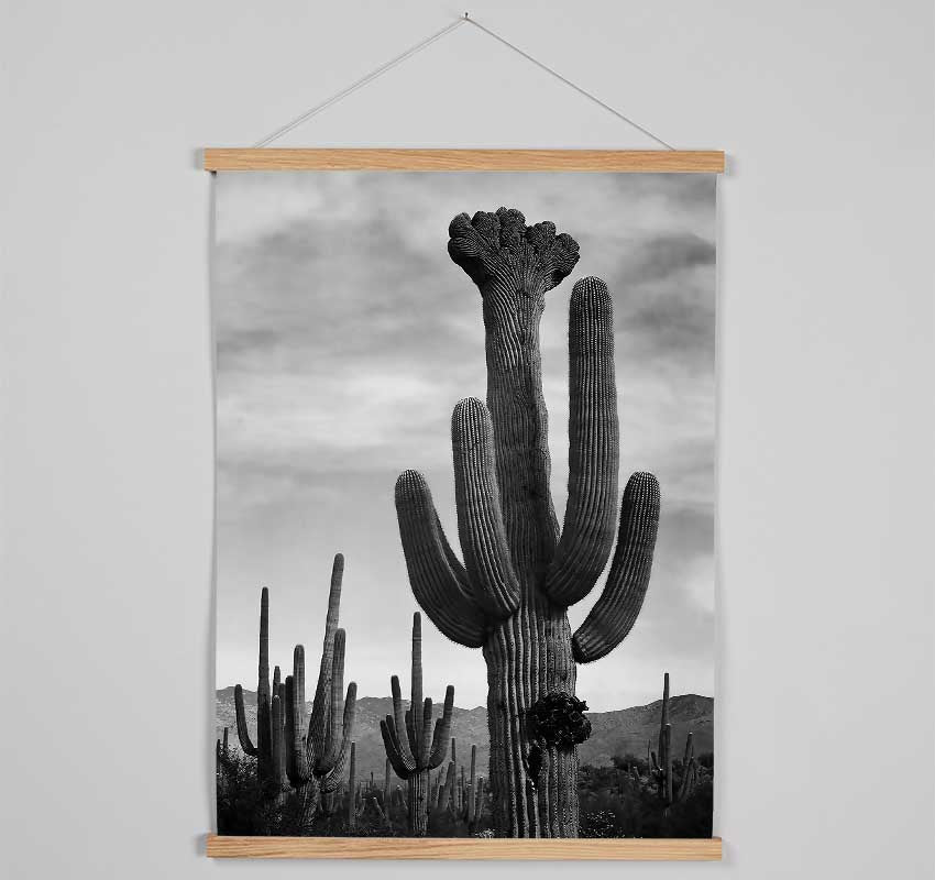 Elegant wooden poster hangers displaying Ansel Adams Cactus print, featuring magnetic fastening and stylish design.