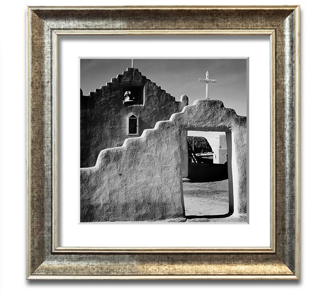 Square framed print of Ansel Adams' Church in Taos Pueblo, showcasing intricate details and available in various frame colors.