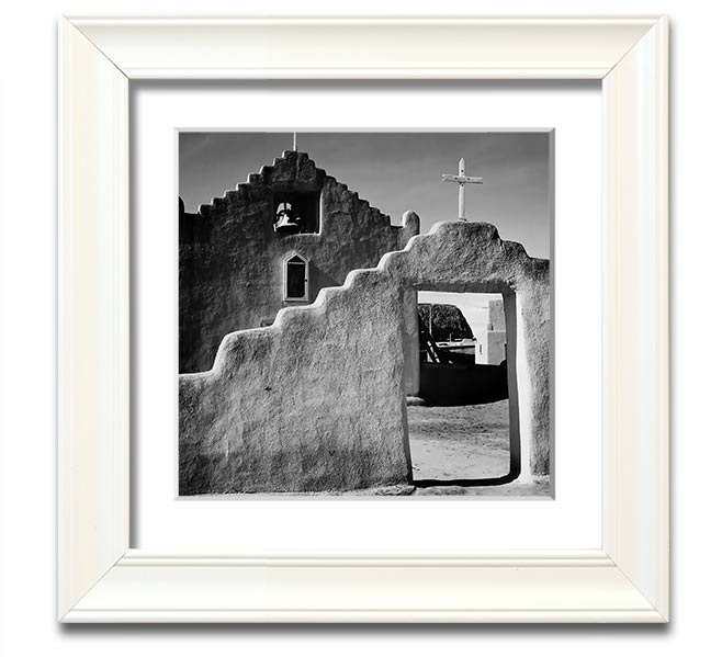 Square framed print of Ansel Adams' Church in Taos Pueblo, showcasing intricate details and available in various frame colors.