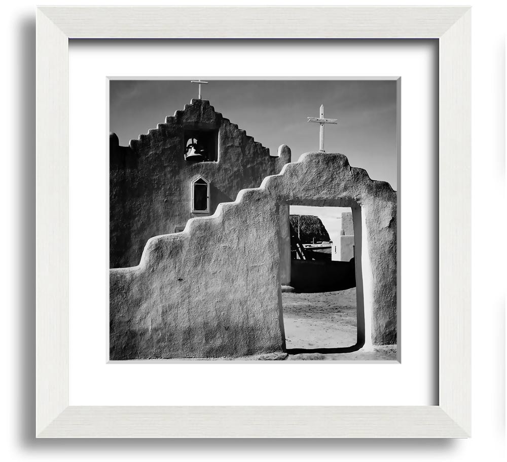 Square framed print of Ansel Adams' Church in Taos Pueblo, showcasing intricate details and available in various frame colors.