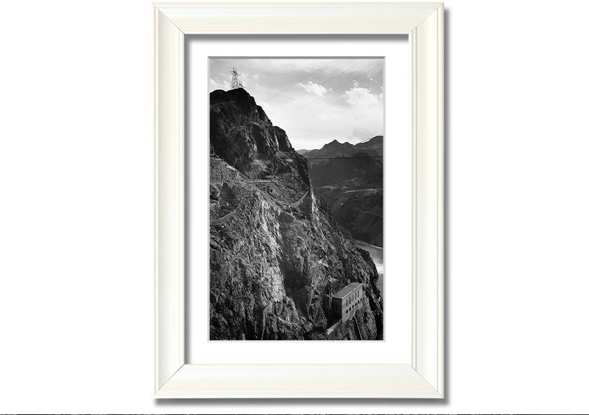 Framed print of Ansel Adams' Cliffs Above Boulder Dam, showcasing stunning black-and-white landscape photography.