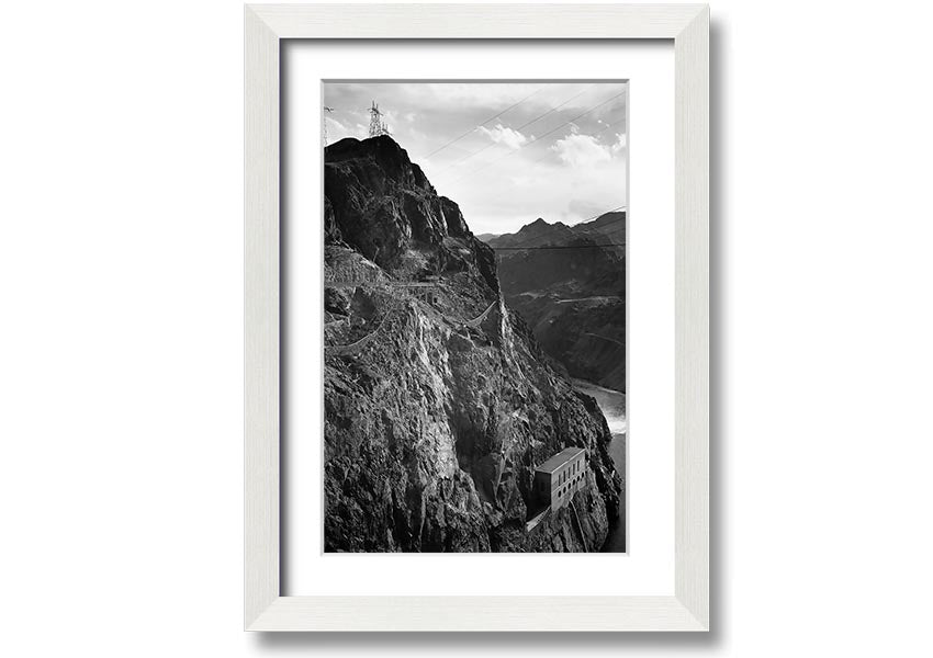 Framed print of Ansel Adams' Cliffs Above Boulder Dam, showcasing stunning black-and-white landscape photography.