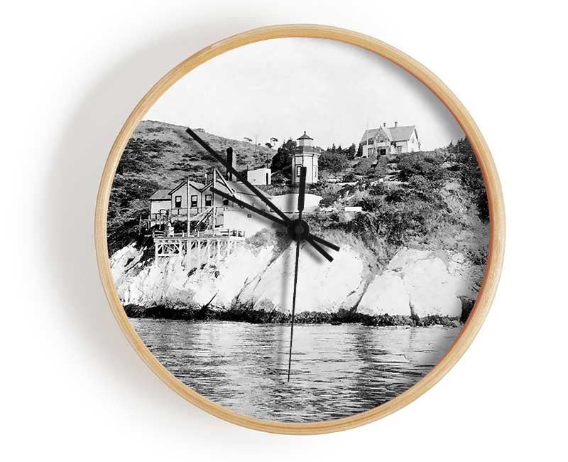 Ansel Adams Yerba Buena clock made from natural bamboo with a round face and clear Plexiglas lens, available in black, white, and natural frame colors.