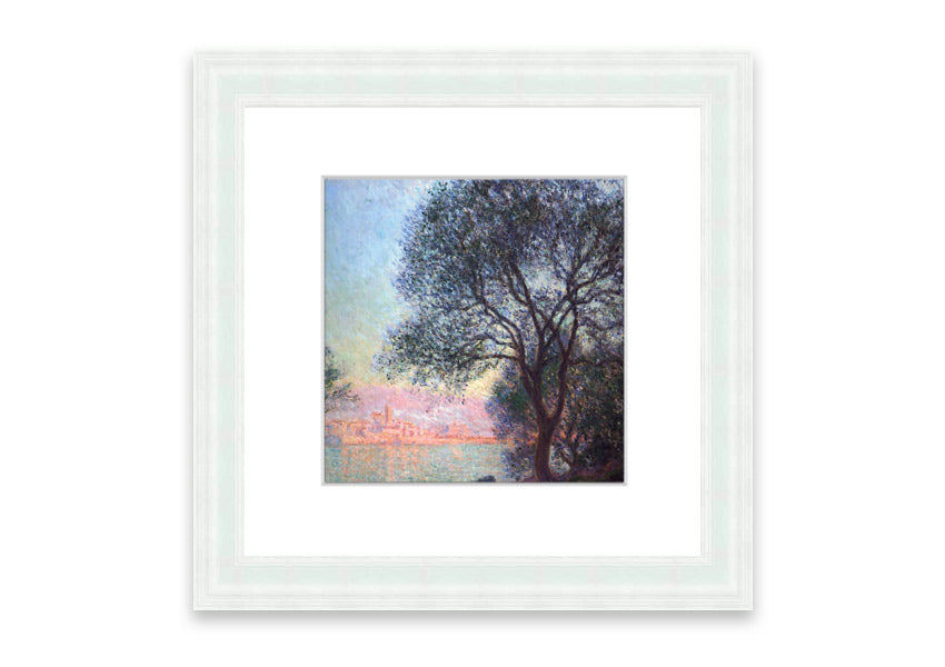 Framed print of Antibes Seen From La Salis by Monet, showcasing vibrant colors and serene coastal scenery.