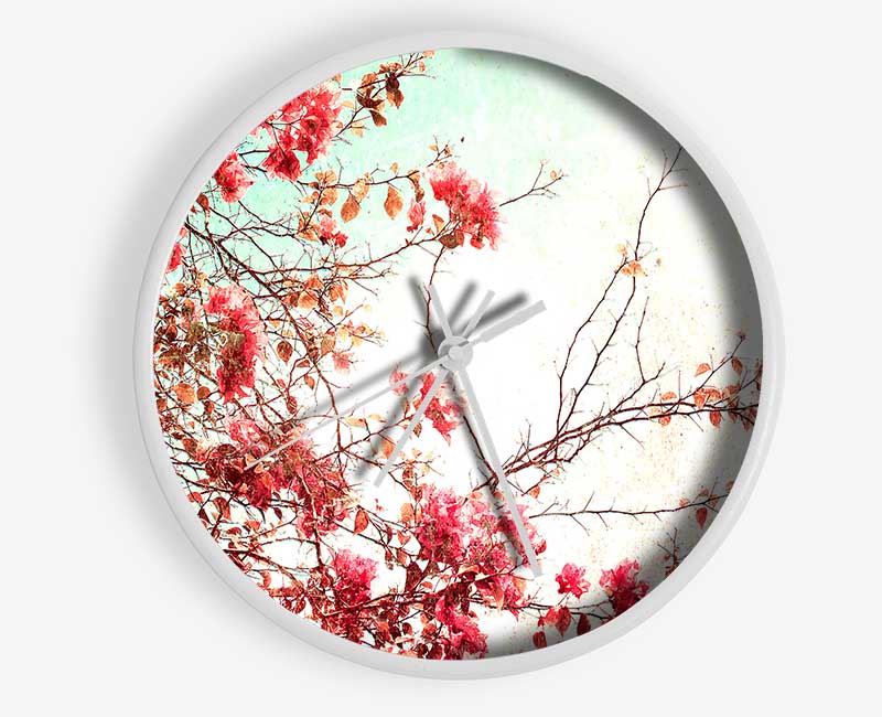 Antique Cherry Blossom clock made from natural bamboo with a round face and clear Plexiglas lens, available in black, white, and natural frame colors.