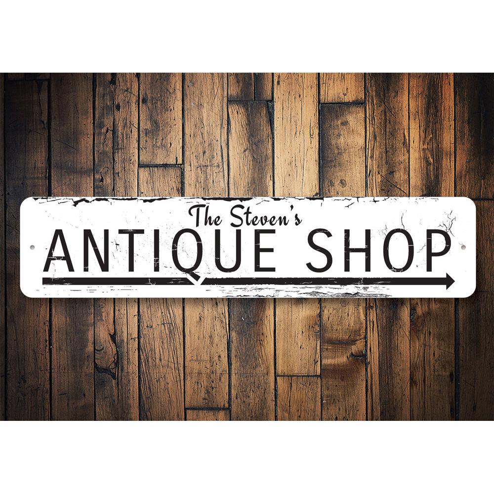 Antique Shop Arrow Sign made of high-quality aluminum, featuring customizable text and pre-drilled holes for easy mounting.