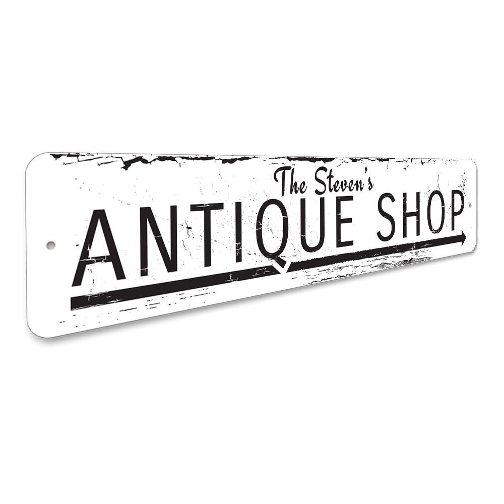 Antique Shop Arrow Sign made of high-quality aluminum, featuring customizable text and pre-drilled holes for easy mounting.