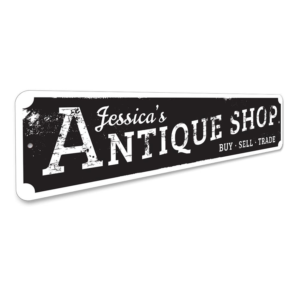 A beautifully crafted antique shop sign made of high-quality aluminum, featuring customizable text and pre-drilled holes for easy mounting.