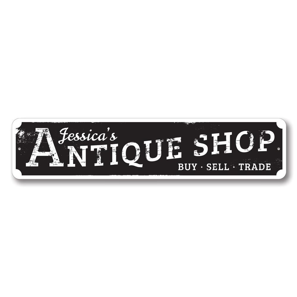 A beautifully crafted antique shop sign made of high-quality aluminum, featuring customizable text and pre-drilled holes for easy mounting.