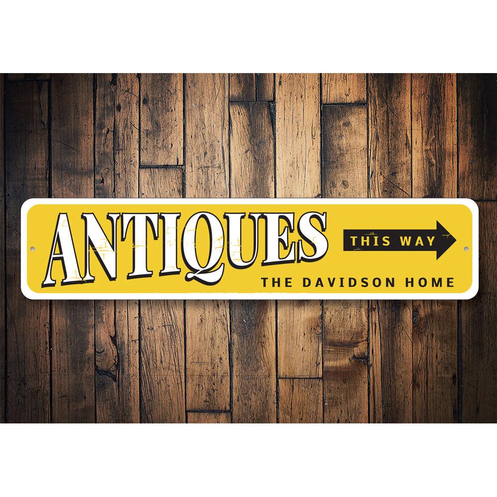 Antiques This Way Sign made of high-quality aluminum, featuring customizable text and pre-drilled holes for easy mounting.