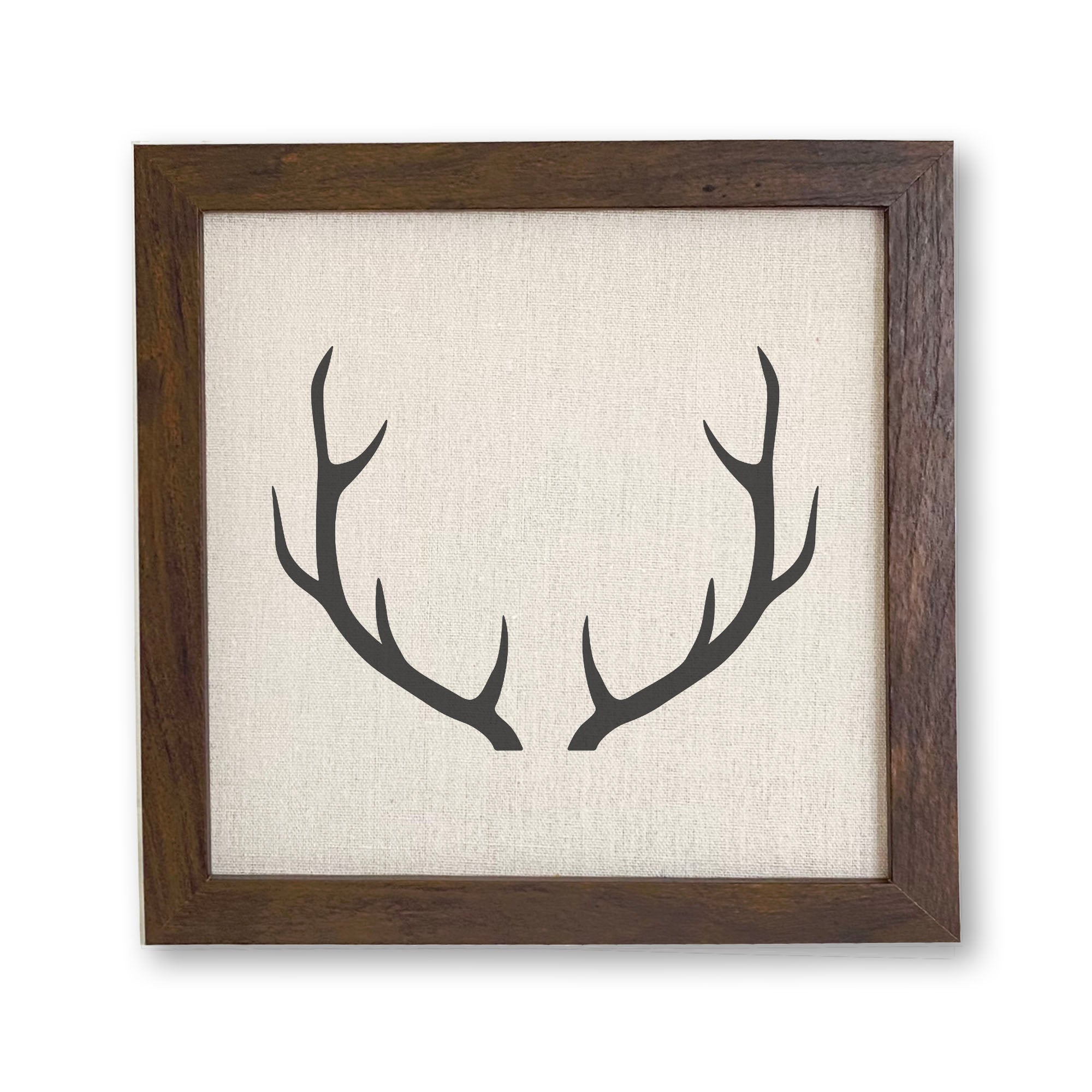 Antlers Framed Sign with a stylized wood frame, eco-friendly printing on a linen-look background.