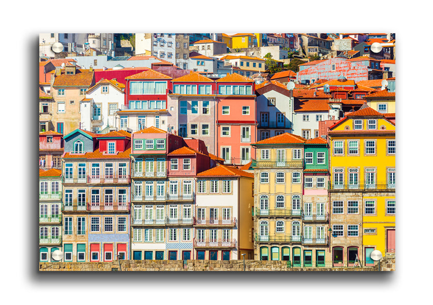 A vibrant acrylic print of coastal apartments, showcasing stunning colors and details, perfect for wall decor.