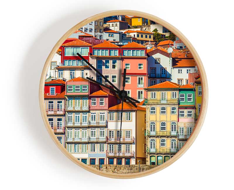 Stylish bamboo clock with a round face and clear Plexiglas lens, available in black, white, and natural frame colors.