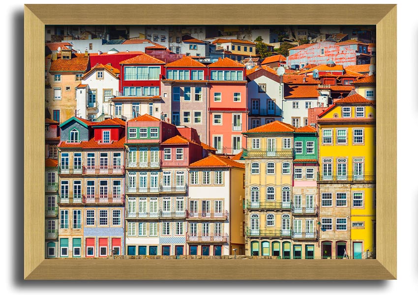 A beautifully framed print of coastal apartments, showcasing vibrant colors and intricate details, ready to hang on the wall.