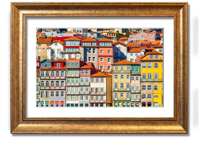 A beautifully framed print of coastal apartments, showcasing vibrant colors and intricate details, ready to hang on the wall.