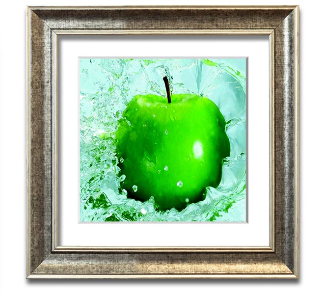 A vibrant Apple Splash Square Framed Print showcasing colorful apple designs in a stylish frame, ready to hang.