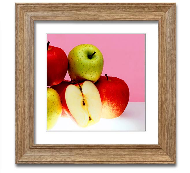 A beautifully framed square print featuring an apple design, available in various frame colors, handmade in the UK.