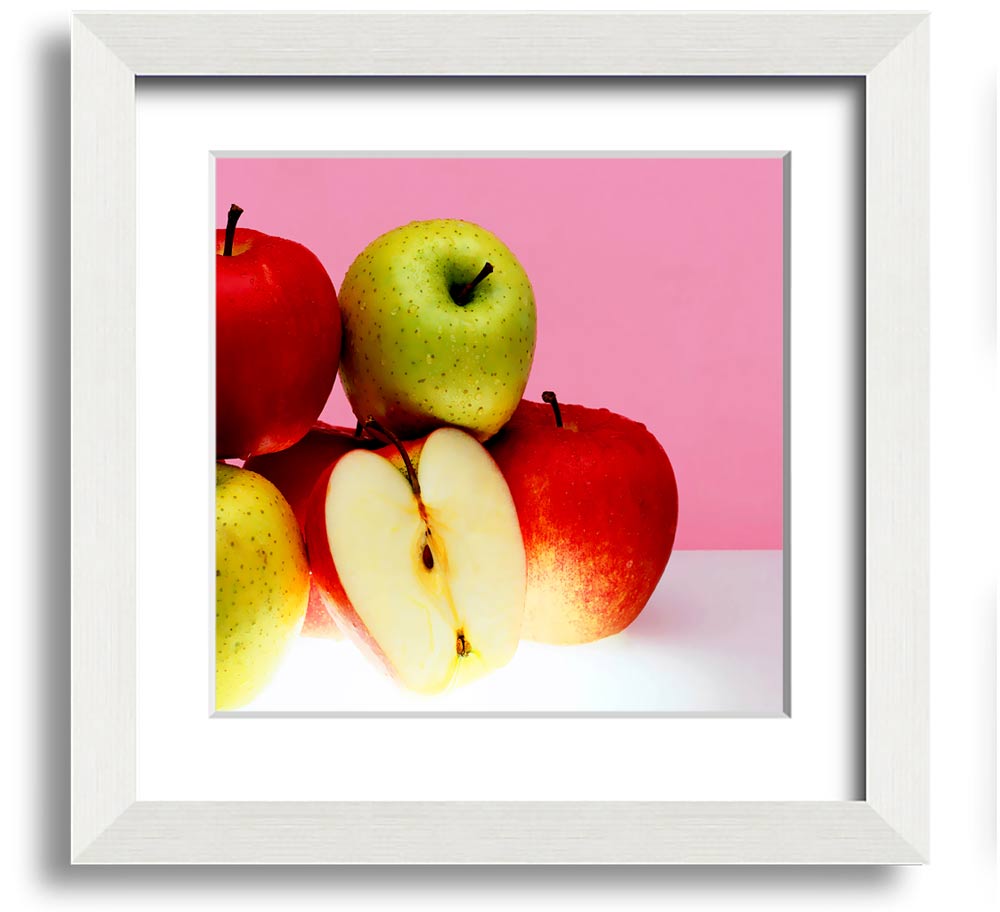 A beautifully framed square print featuring an apple design, available in various frame colors, handmade in the UK.