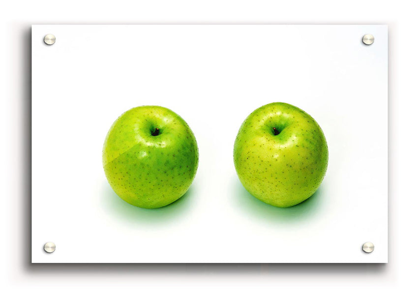 A vibrant acrylic print of two apples, showcasing rich colors and details, mounted on 5mm thick acrylic glass.