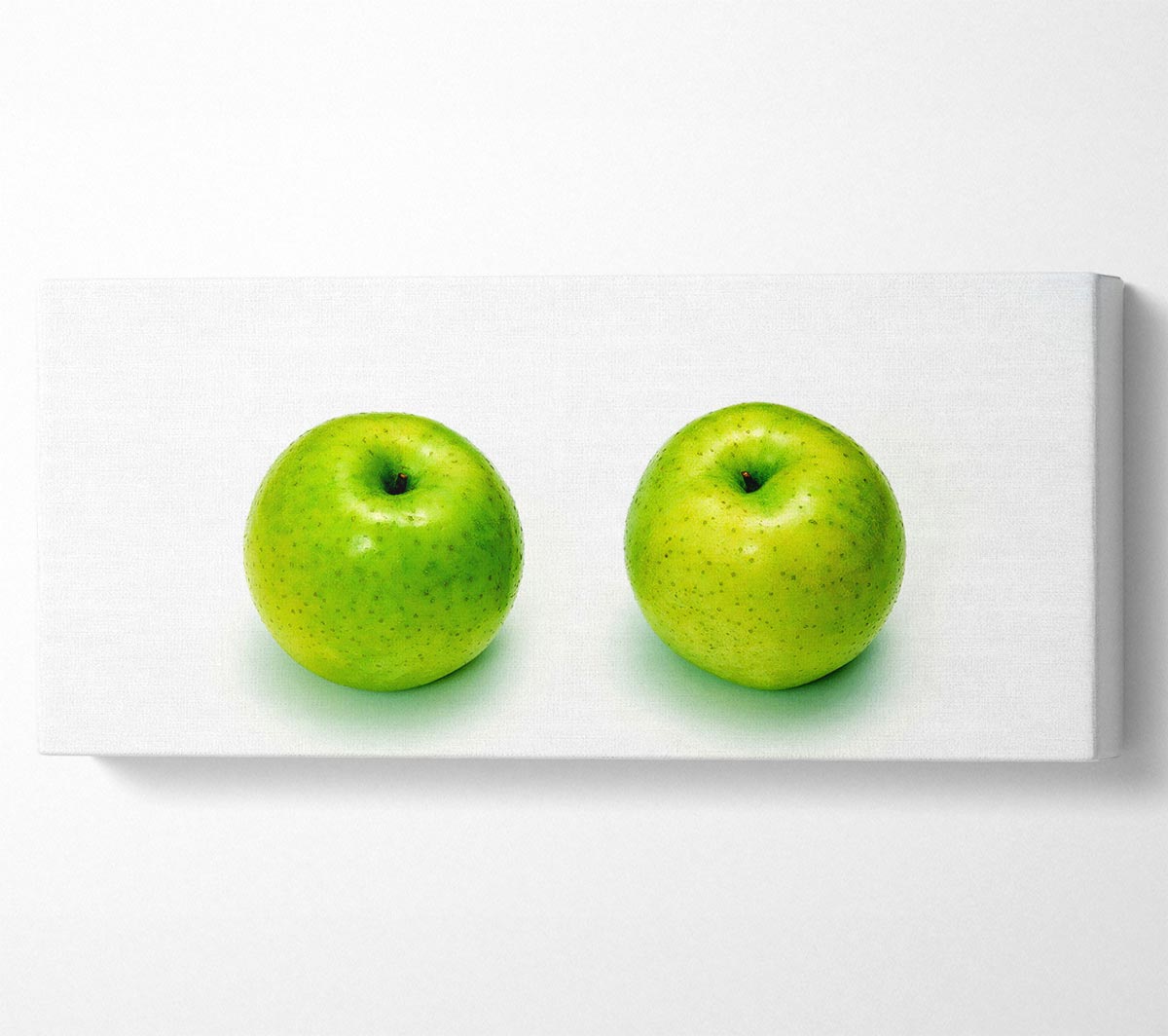 Vibrant Apple Twins canvas art mounted on a sturdy box frame, ready to hang.