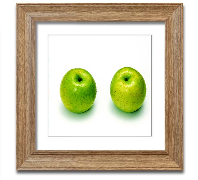 Apple Twins Square Framed Print showcasing vibrant colors and unique design, available in various frame colors.