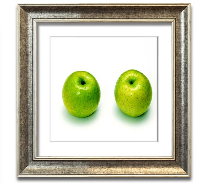 Apple Twins Square Framed Print showcasing vibrant colors and unique design, available in various frame colors.