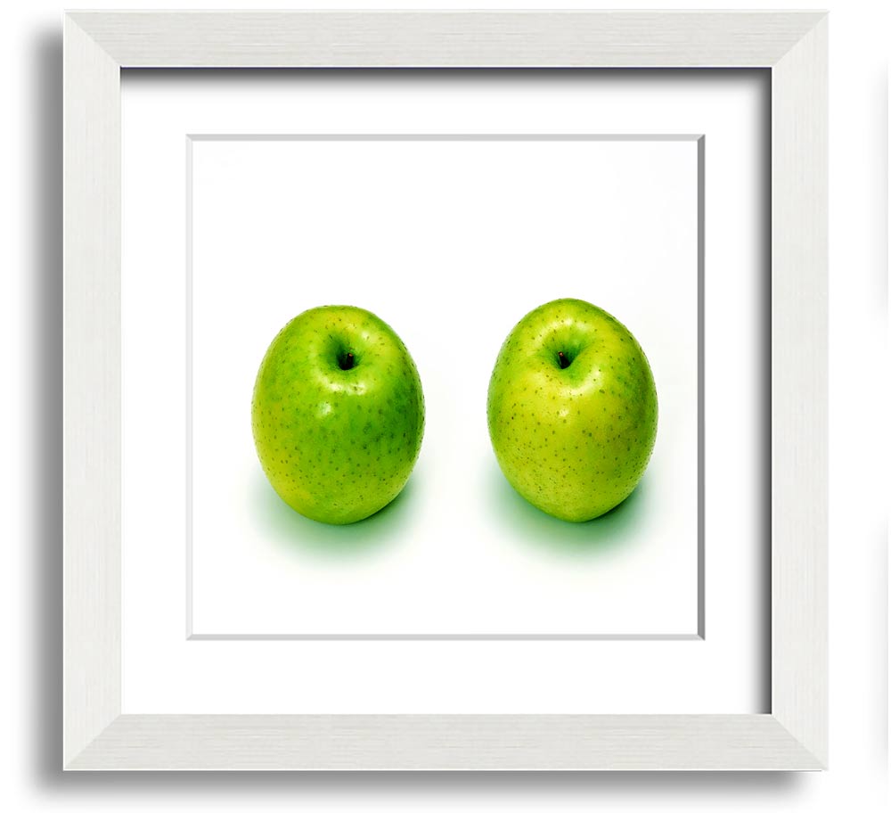 Apple Twins Square Framed Print showcasing vibrant colors and unique design, available in various frame colors.