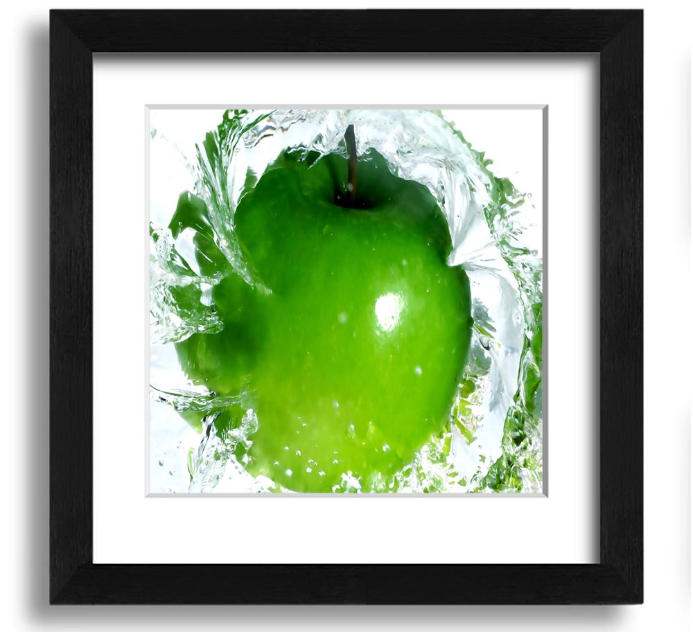 A vibrant square framed print of apples splashing in water, showcasing bright colors and dynamic imagery, ready to hang.