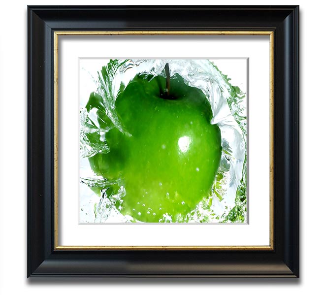 A vibrant square framed print of apples splashing in water, showcasing bright colors and dynamic imagery, ready to hang.