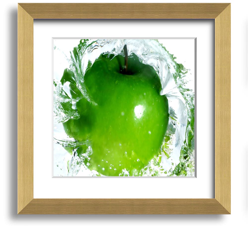 A vibrant square framed print of apples splashing in water, showcasing bright colors and dynamic imagery, ready to hang.