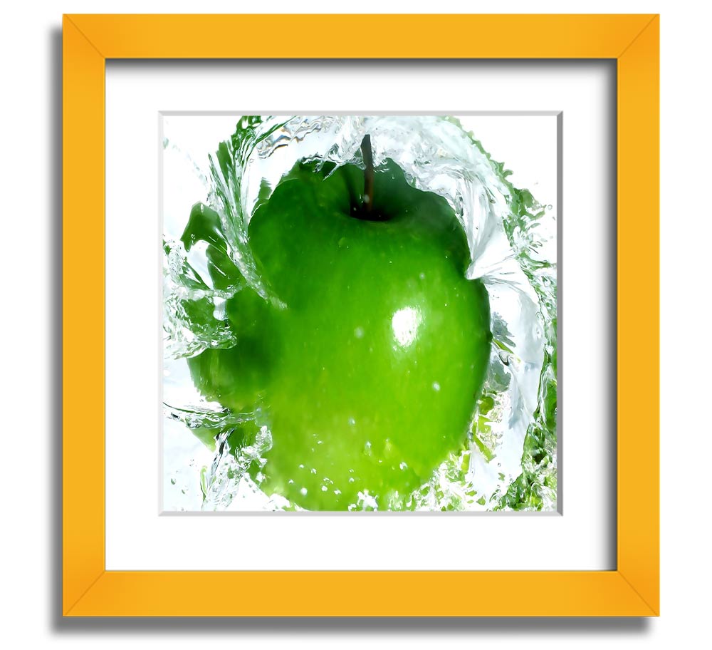 A vibrant square framed print of apples splashing in water, showcasing bright colors and dynamic imagery, ready to hang.