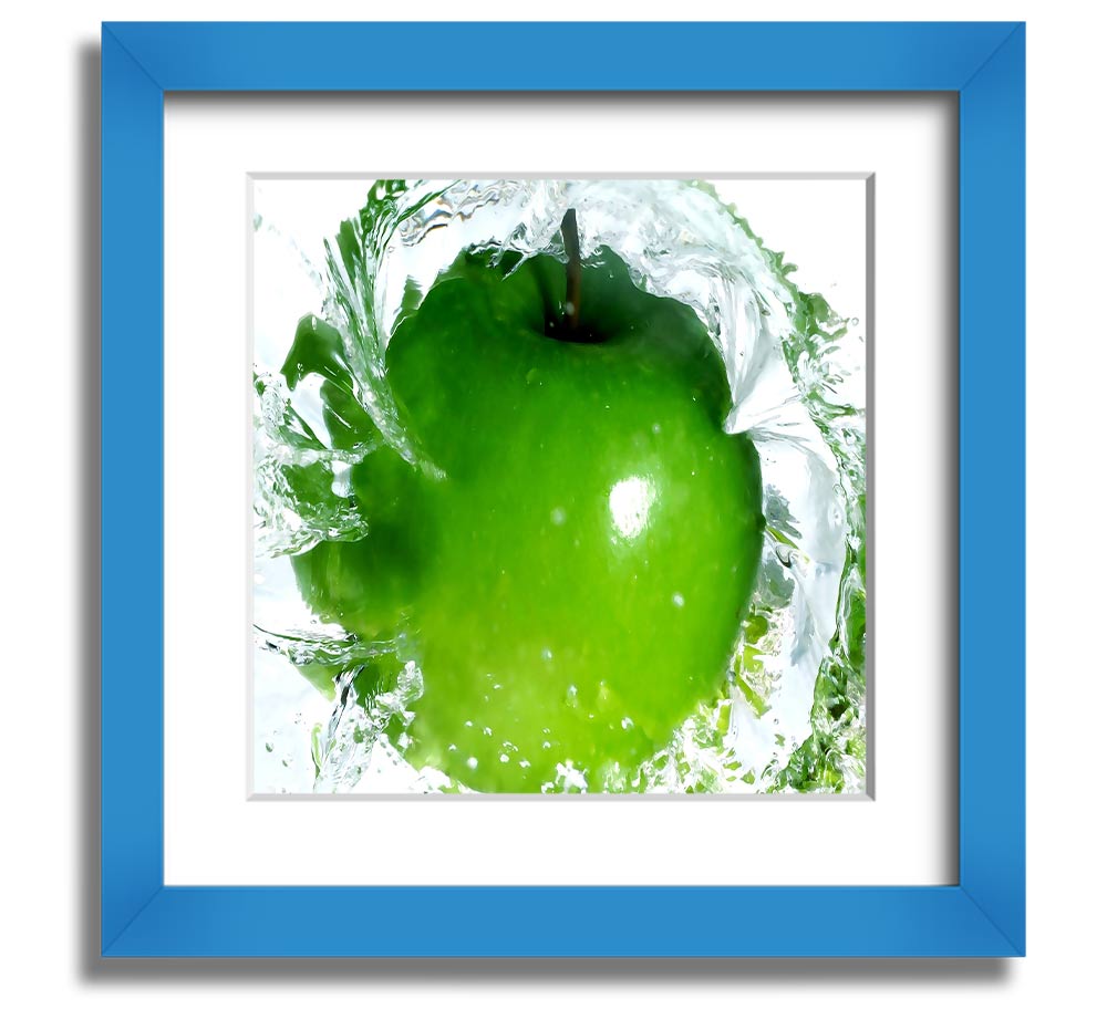 A vibrant square framed print of apples splashing in water, showcasing bright colors and dynamic imagery, ready to hang.