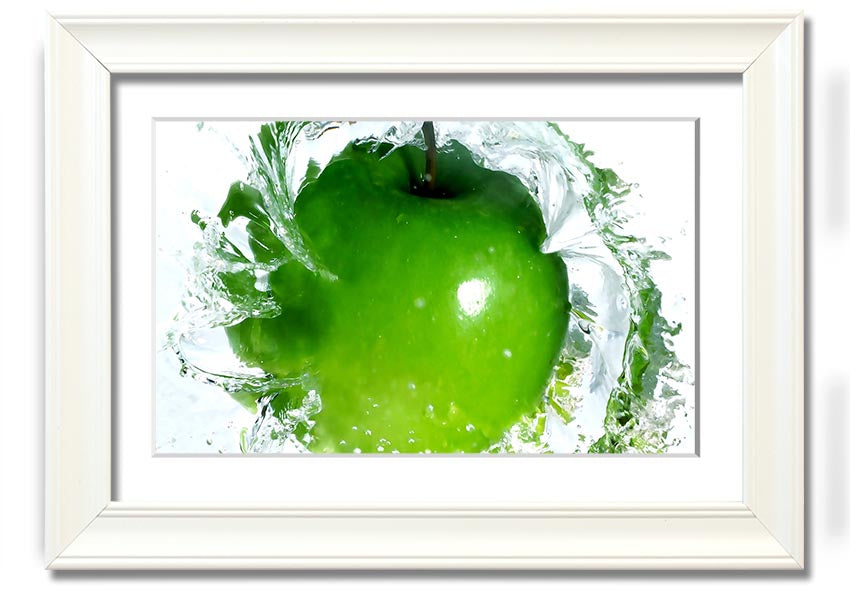 A vibrant framed print of an apple water splash, showcasing dynamic colors and textures, ready to hang on a wall.