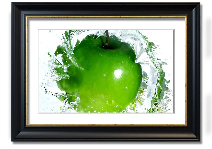 A vibrant framed print of an apple water splash, showcasing dynamic colors and textures, ready to hang on a wall.