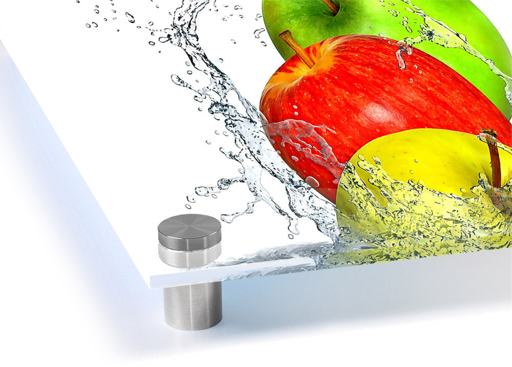 Acrylic print of vibrant apples splashing in water, showcasing bright colors and dynamic movement.