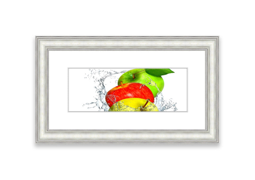 Framed print of apples splashing in water, showcasing vibrant colors and dynamic movement, available in various frame colors.