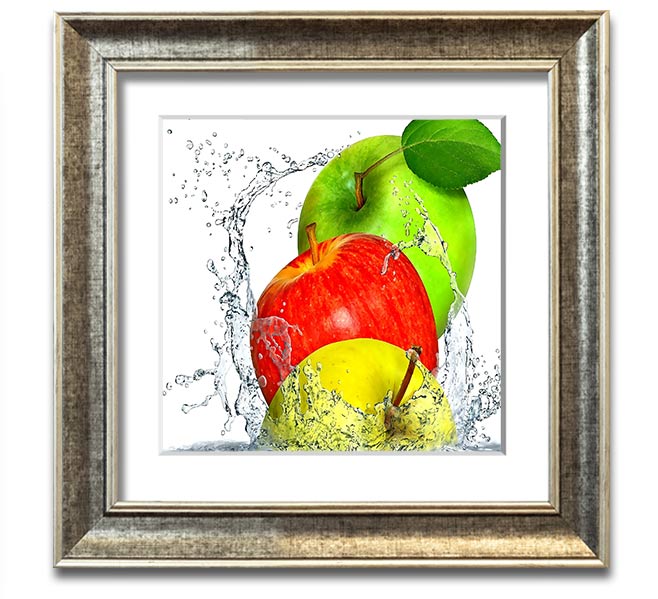 A vibrant square framed print featuring apples splashing in water, showcasing dynamic colors and a refreshing design.