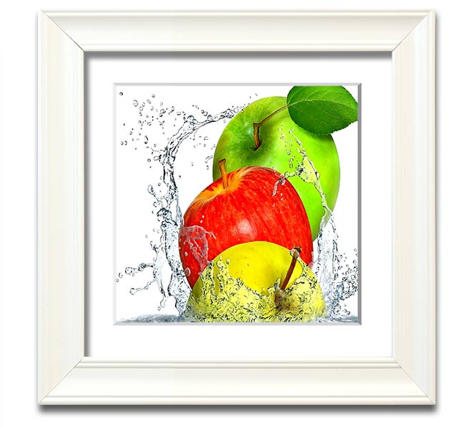 A vibrant square framed print featuring apples splashing in water, showcasing dynamic colors and a refreshing design.